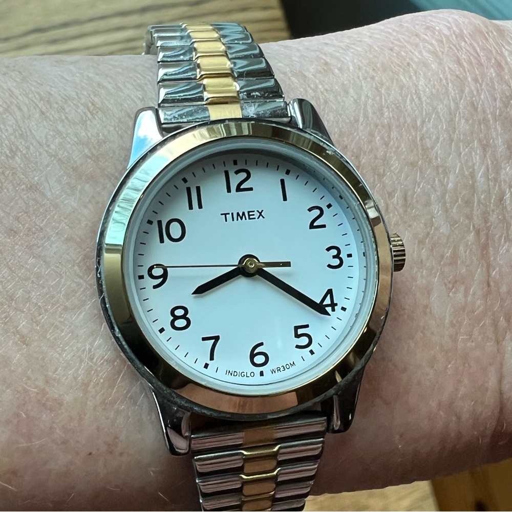 Timex Woman’s Watch, two-tone stainless stretch band, Indiglo dial.